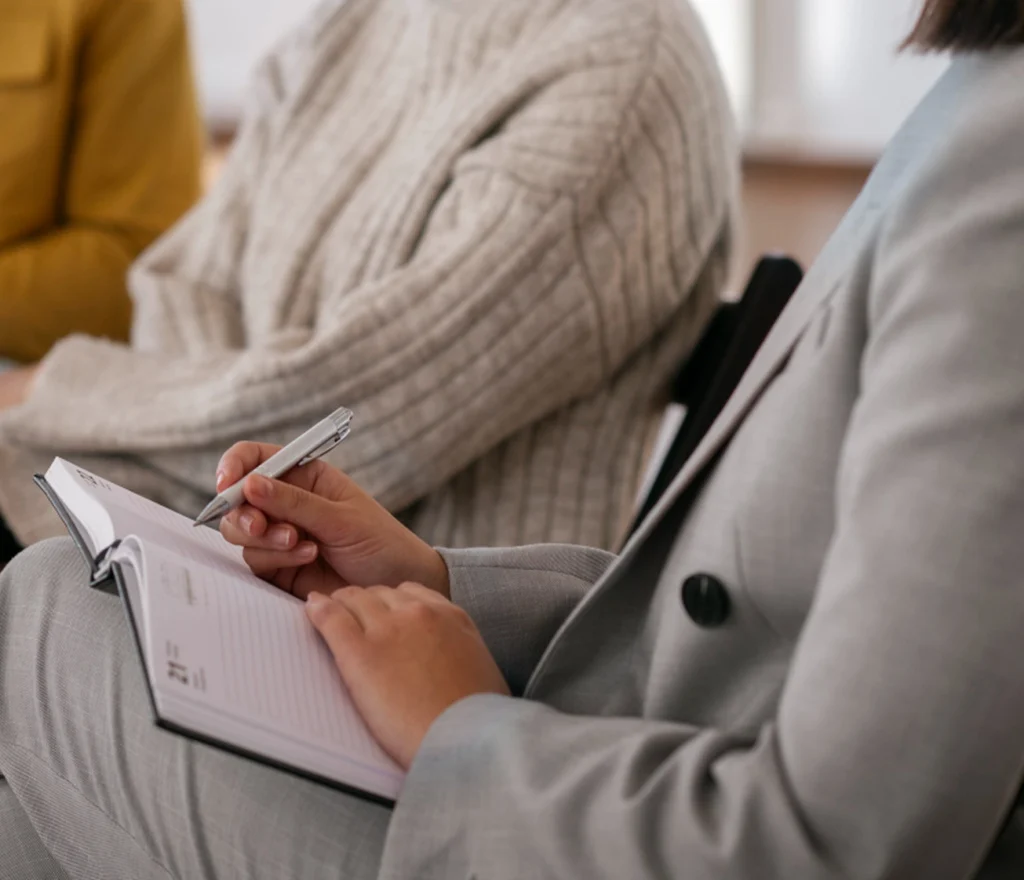 Doctor holding hands with senior patient